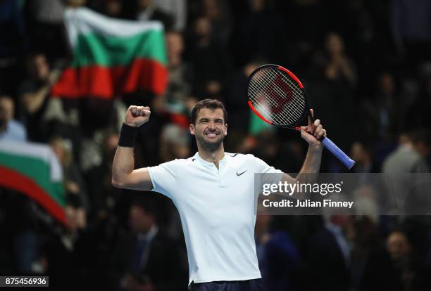 Grigor Dimitrov of Bulgaria celebrates victory in his Singles match against Pablo Carreno Busta of Spain during day six of the Nitto ATP World Tour...