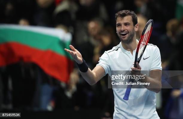 Grigor Dimitrov of Bulgaria celebrates victory in his Singles match against Pablo Carreno Busta of Spain during day six of the Nitto ATP World Tour...