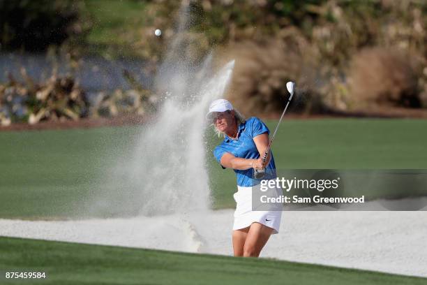 Suzann Pettersen of Norway plays a shot from a bunker on the 17th hole during round two of the CME Group Tour Championship at the Tiburon Golf Club...