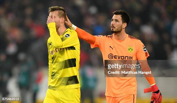 Andrey Yarmolenko of Dortmund and Roman Buerki of Dortmund are looking dejected after loosing the Bundesliga match between VfB Stuttgart and Borussia...