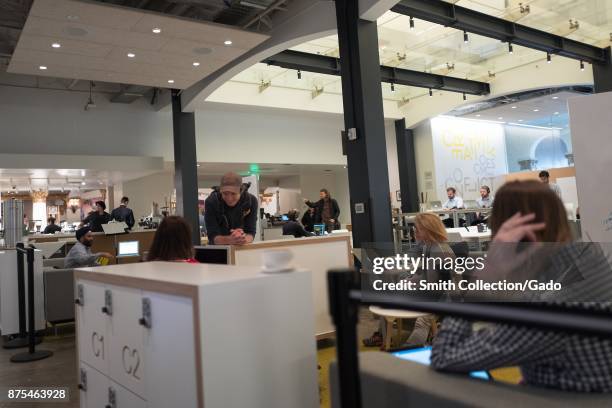 HanaHaus co-working space at the Blue Bottle Coffee shop in Silicon Valley, Palo Alto, California, part of an adaptive reuse which turned the former...