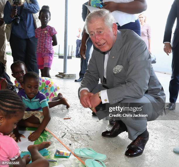 Prince Charles, Prince of Wales meets displaced Barbudans as he visits the National Technical Training Centre to meet residents of Barbuda who have...