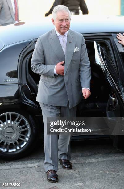 Prince Charles, Prince of Wales arrives at the National Technical Training Centre to meet residents of Barbuda who have been displaced by the...