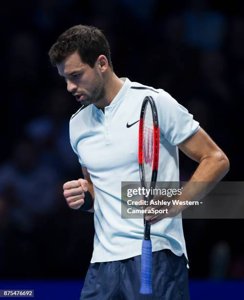 Grigor Dimitrov of Bulgaria in action during his victory over Pablo Carreno Busta of Spain during their Group Pete Sampras match today - Dimitrov def...