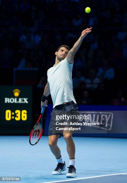 Grigor Dimitrov of Bulgaria in action during his victory over Pablo Carreno Busta of Spain during their Group Pete Sampras match today - Dimitrov def...