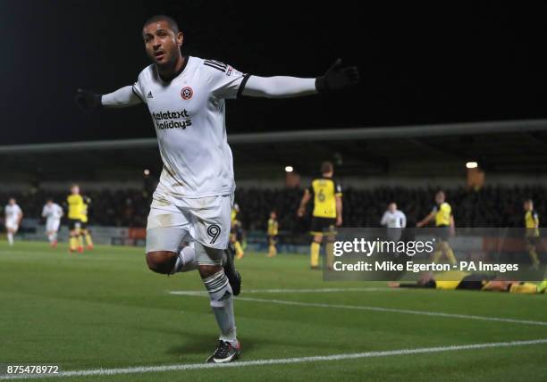 Sheffield United's Leon Clarke celebrates their third goal during the Sky Bet Championship match at The Pirelli Stadium, Burton.