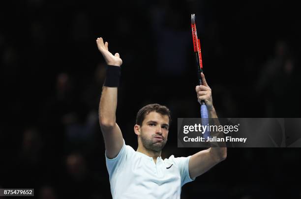 Grigor Dimitrov of Bulgaria celebrates victory in his Singles match against Pablo Carreno Busta of Spain during day six of the Nitto ATP World Tour...