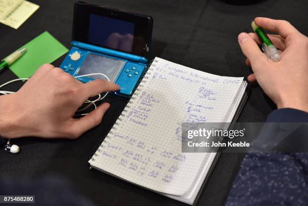 Ompetitor makes notes during the Pokemon European International Championships at ExCel on November 17, 2017 in London, England. Thousands of...