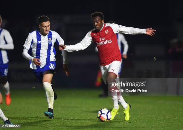 Tolaji Bola of Arsenal takes on Diogo Dalot of Porto during the match between Arsenal U23 and Porto at Meadow Park on November 17, 2017 in...