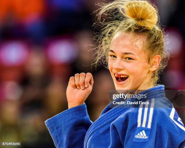 With blood on her front teeth, seventeen year old Daria Bilodid of Ukraine celebrates winning the u48kg gold medal during The Hague Judo Grand Prix...