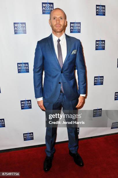 Host Oliver Trevena attends the Media Access Awards 2017 at The Four Seasons on November 17, 2017 in Beverly Hills, California.