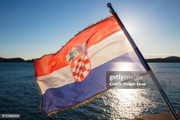 croatian flag aboard cruise ship ms romantic star (reisebuero mittelthurgau), sibenik, sibenik-knin, croatia - croatian flag foto e immagini stock