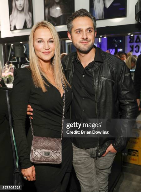 Caroline Beil and Philipp Sattler attend the Apjar Black studio opening on November 17, 2017 in Berlin, Germany.