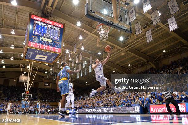 Grayson Allen of the Duke Blue Devils drive3s for a uncontested layup against the Southern University Jaguars during their game at Cameron Indoor...