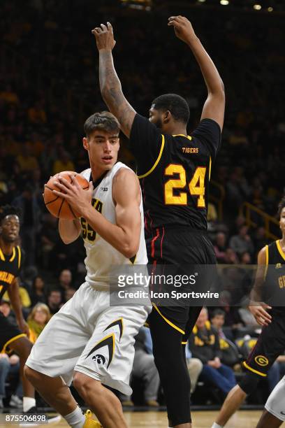 Grambling State guard Dionte Jones gets ready to block a shot by Iowa forward Luka Garza during a non-conference college basketball game between the...