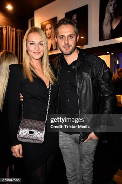 Caroline Beil and her partner Philipp Sattler attend the Apjar Black studio opening on November 17, 2017 in Berlin, Germany.