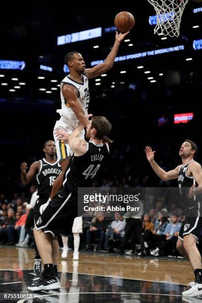 Rodney Hood of the Utah Jazz takes a shot against Tyler Zeller of the Brooklyn Nets in the second quarter during their game at Barclays Center on...