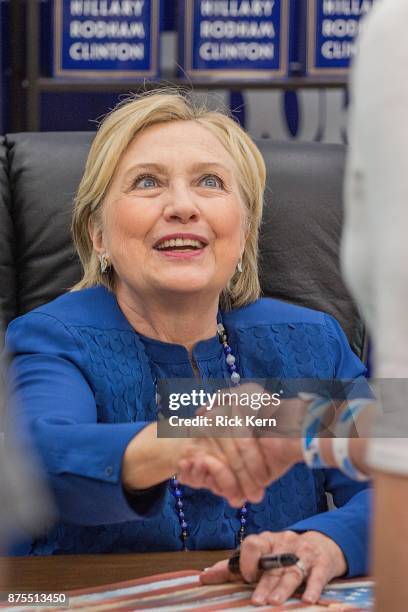 Former U.S. Secretary of State Hillary Rodham Clinton signs copies of her new book 'What Happened' at BookPeople on November 17, 2017 in Austin,...