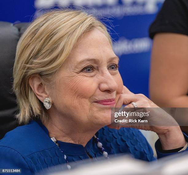 Former U.S. Secretary of State Hillary Rodham Clinton signs copies of her new book 'What Happened' at BookPeople on November 17, 2017 in Austin,...