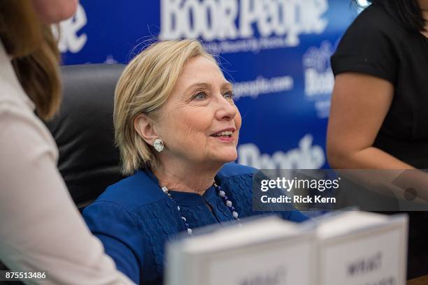 Former U.S. Secretary of State Hillary Rodham Clinton signs copies of her new book 'What Happened' at BookPeople on November 17, 2017 in Austin,...