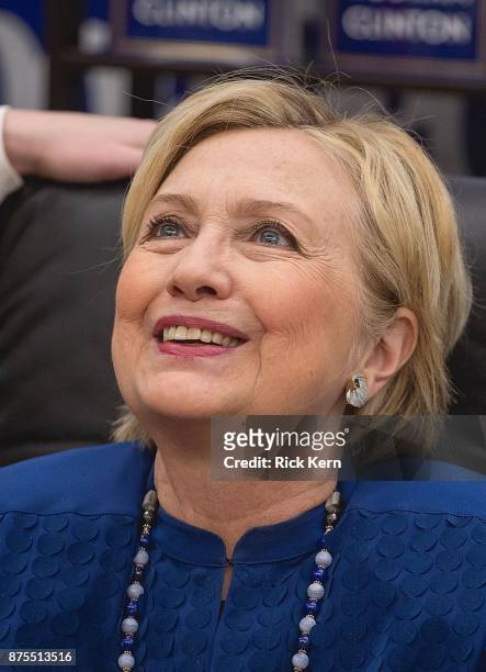 Former U.S. Secretary of State Hillary Rodham Clinton signs copies of her new book 'What Happened' at BookPeople on November 17, 2017 in Austin,...