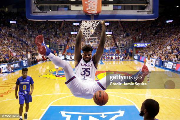 Udoka Azubuike of the Kansas Jayhawks dunks during the 1st half of the game against the South Dakota State Jackrabbits at Allen Fieldhouse on...