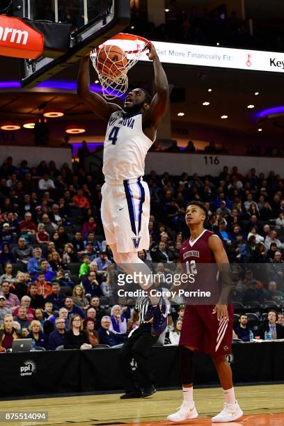 Eric Paschall of the Villanova Wildcats dunks against Auston Evans of the Lafayette Leopards during the first half at the PPL Center on November 17,...