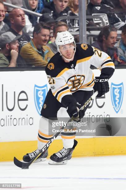 Jordan Szwarz of the Boston Bruins handles the puck during a game against the Los Angeles Kings at STAPLES Center on November 16, 2017 in Los...