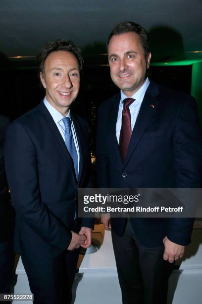 Stephane Bern and Prime Minister of Luxembourg Xavier Bettel attend the 22th Edition of "'Les Sapins de Noel des Createurs - Designer's Christmas...