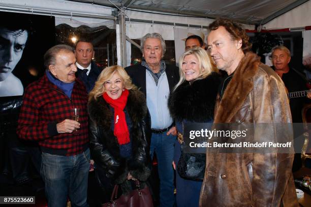 Jean-Pierre Kalfon, Nicoletta, Alain Delon, guest and Jean-Christophe Molinier attend "La Grande Roue de Paris" : Opening Ceremony at Place de la...