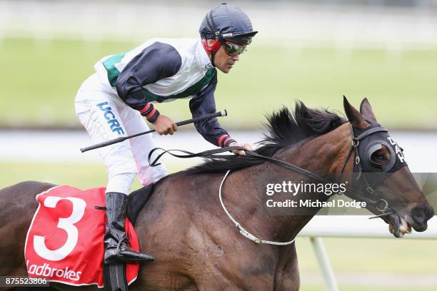 Jockey Michael Walker riding Fanatic wins race 3 the Ladbrokes Sandown Cup during Melbourne Racing at Sandown Lakeside on November 18, 2017 in...