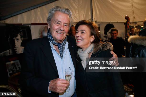 Alain Delon and Carole Amiel attend "La Grande Roue de Paris" : Opening Ceremony at Place de la Condorde on the Champs Elysees on November 17, 2017...