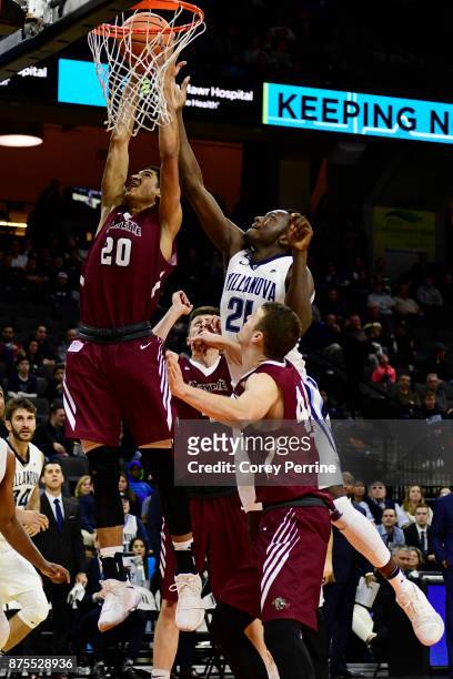 Stephens of the Lafayette Leopards battles with Dhamir Cosby-Roundtree of the Villanova Wildcats during the second half at the PPL Center on November...