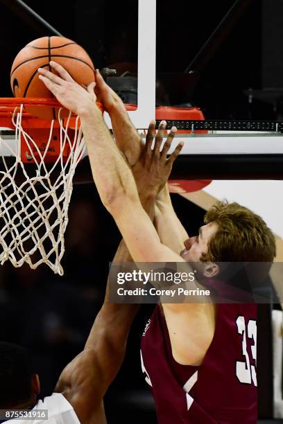 Paulius Zalys of the Lafayette Leopards dunks on Jermaine Samuels of the Villanova Wildcats during the first half at the PPL Center on November 17,...