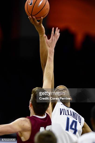 Omari Spellman of the Villanova Wildcats wins the tip off against Lukas Jarrett of the Lafayette Leopards during the first half at the PPL Center on...