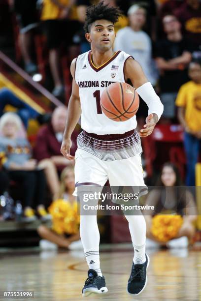 Arizona State Sun Devils guard Remy Martin moves the ball up court during the college basketball game between the Northern Arizona Lumberjacks and...