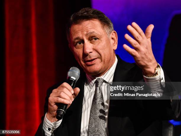 General manager and executive Vice President of the Detroit Red Wings Ken Holland take part in a discussion at the Chamber of Commerce of...