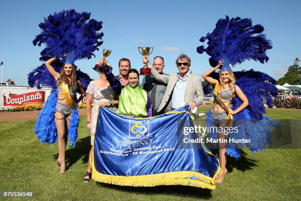 Jockey Sam Spratt celebrates with owners of Gobstopper after winning race 10 154th New Zealand Cup during day three of the New Zealand Cup at...