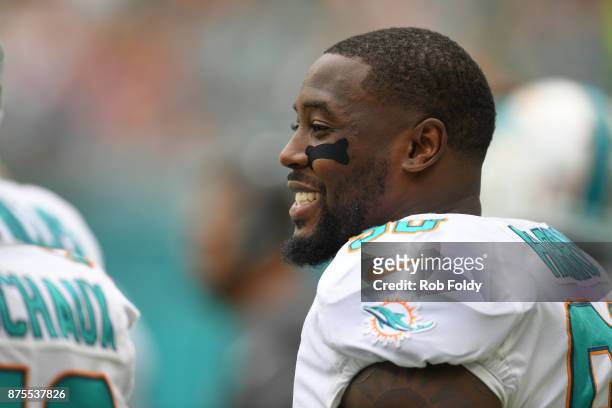 Charles Harris of the Miami Dolphins looks on during the game against the New York Jets at Hard Rock Stadium on October 22, 2017 in Miami Gardens,...