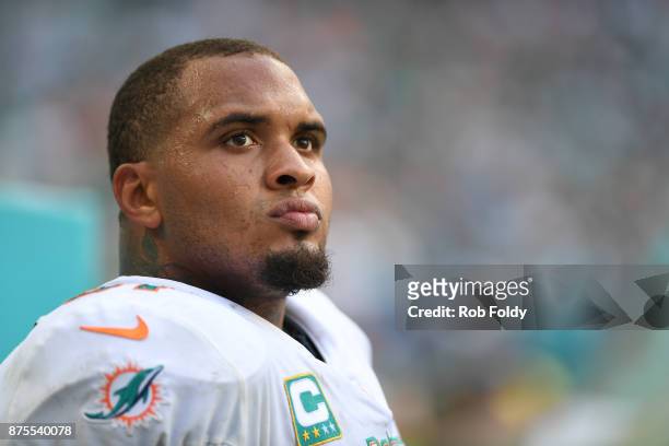 Mike Pouncey of the Miami Dolphins looks on from the sideline during the game against the New York Jets at Hard Rock Stadium on October 22, 2017 in...
