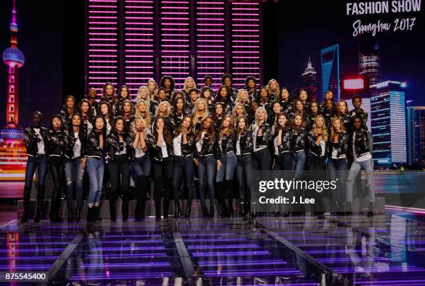 Victoria's Secret models pose during the 2017 Victoria's Secret Fashion Show Model Group Appearance in the Mercedes Benz Arena on November 18, 2017...