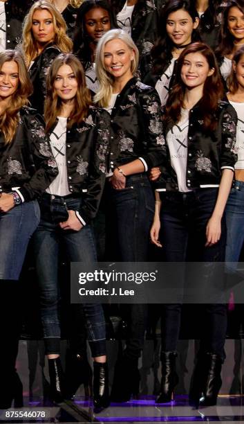 Victoria's Secret models Stella Maxwell, Karlie Kloss and Ming Xi pose during the 2017 Victoria's Secret Fashion Show Model Group Appearance in the...