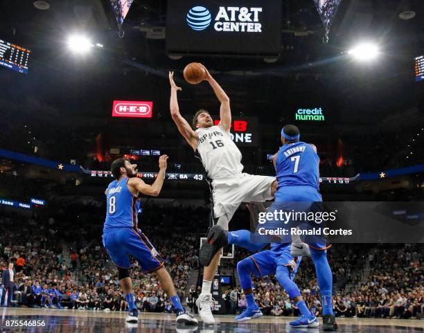 Pau Gasol of the San Antonio Spurs goes up for a rebound against the Oklahoma City Thunder at AT&T Center on November 17, 2017 in San Antonio, Texas....