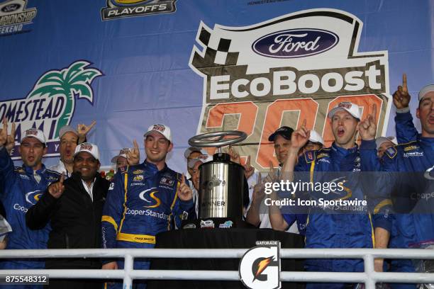 Chase Briscoe, driver of the Cooper Standard Ford celebrates winning the NASCAR Camping World Truck Series - Ford EcoBoost 200 on November 17, 2017...