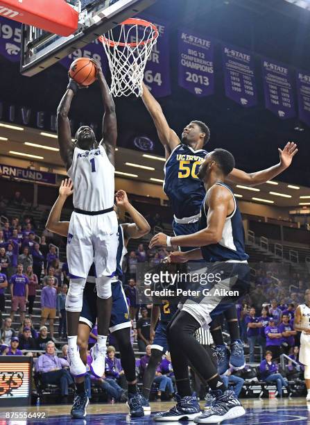 Forward Mawdo Sallah of the Kansas State Wildcats drives to the basket against forward Elston Jones of the California-Irvine Anteaters during the...