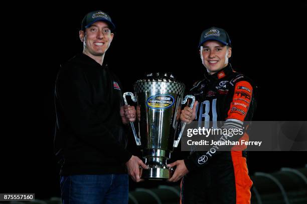 Team owner Kyle Busch and Christopher Bell, driver of the JBL Toyota, poses with the trophy after winning the Camping World Truck Series Championship...