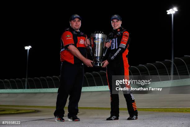 Crew chief crew chief Ryan Fugle and Christopher Bell, driver of the JBL Toyota, poses with the trophy after winning the Camping World Truck Series...