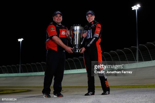 Crew chief crew chief Ryan Fugle and Christopher Bell, driver of the JBL Toyota, poses with the trophy after winning the Camping World Truck Series...