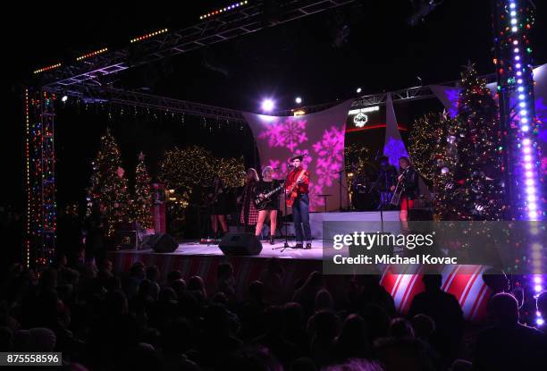 Sean Oliu and Friends performs onstage at Cost Plus World Market Celebrates Christmas With Singer Rachel Platten At The Promenade At Westlake on...