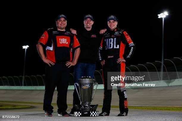 Crew chief Ryan Fugle, team owner Kyle Busch and Christopher Bell, driver of the JBL Toyota, poses with the trophy after winning the Camping World...